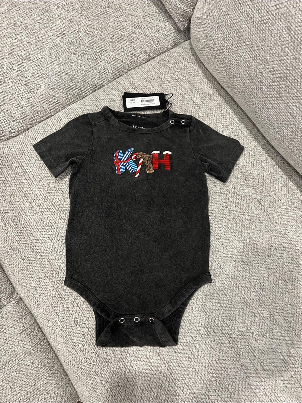 Kith Black One-Piece with Multicolor Logo